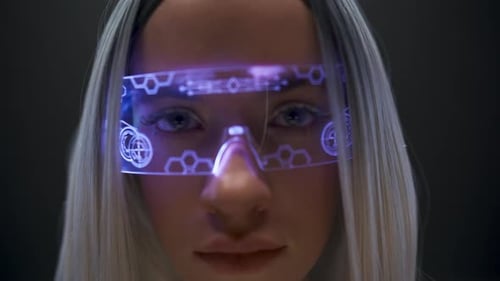 Woman wearing futuristic glasses with interface overlay