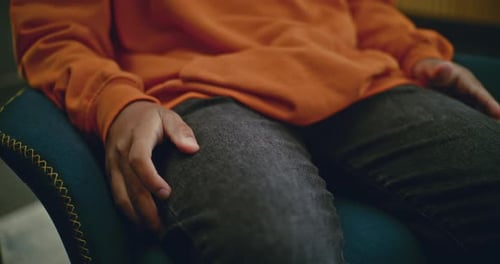 Close Up of Stressed African American Boy Gesturing During Counseling Session