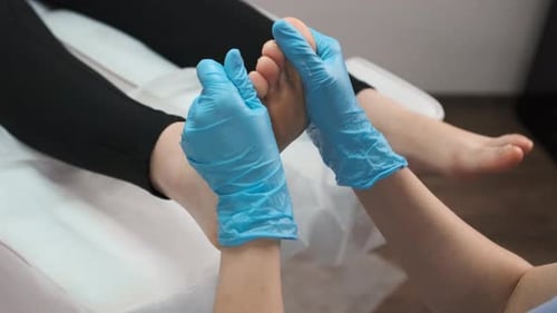 Adult Receives Gentle Foot Massage at Home