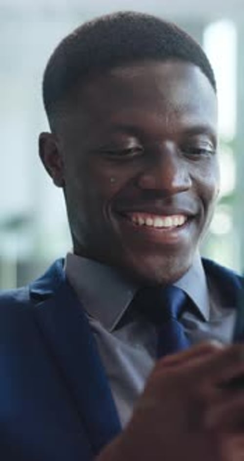 Business, smartphone and black man with smile, financial advisor and email for profit growth