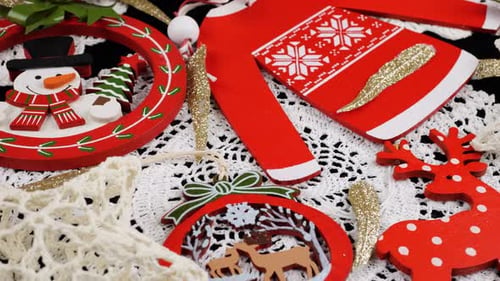 Close-up of handmade red and white Christmas ornaments. Festive holiday season decorations