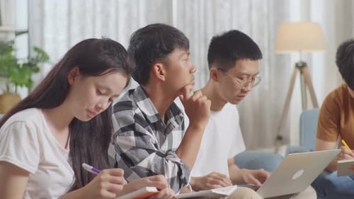 Focused Students Studying Together Indoors