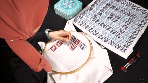 Creative Young Adult Working on Textile Embroidery Art