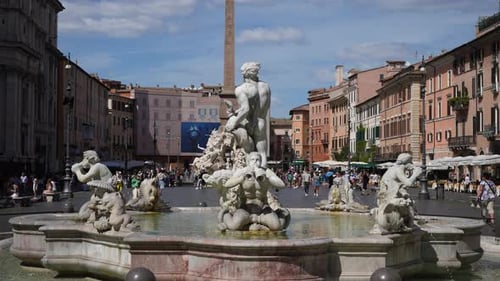 Front Wide Shot of Fontana Del Moro Moor Fountain Located in Piazza Navona on Sunny Day It