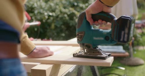 The corner of the wood plank is sawed off