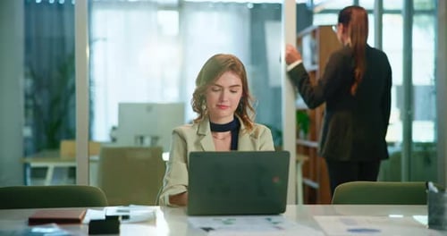 Office, typing and woman at laptop with research, review or web analysis for business plan