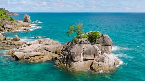 Rocky Coastline with Turquoise Waters and Greenery Seychelles Mahe