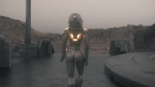 Astronaut walking along the base. Futuristic colonization and space exploration concept