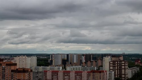 Fast Clouds Moving Over Dense Urban Cityscape