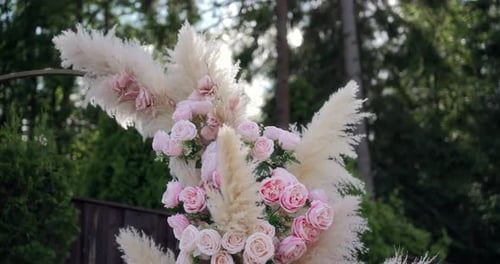 Elegant Pink Roses and Pampas Grass Arrangement