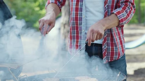 Grilling Up Some Delicious and Juicy Burgers at a Fun Summer BBQ Party with Friends