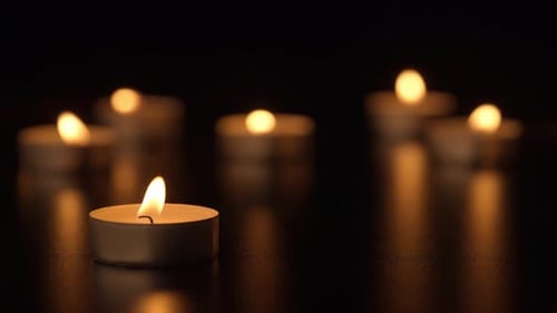 Candlelight Glows in the Darkness