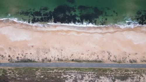 View of the Road Along the Sea Sandy Coast From the Drone