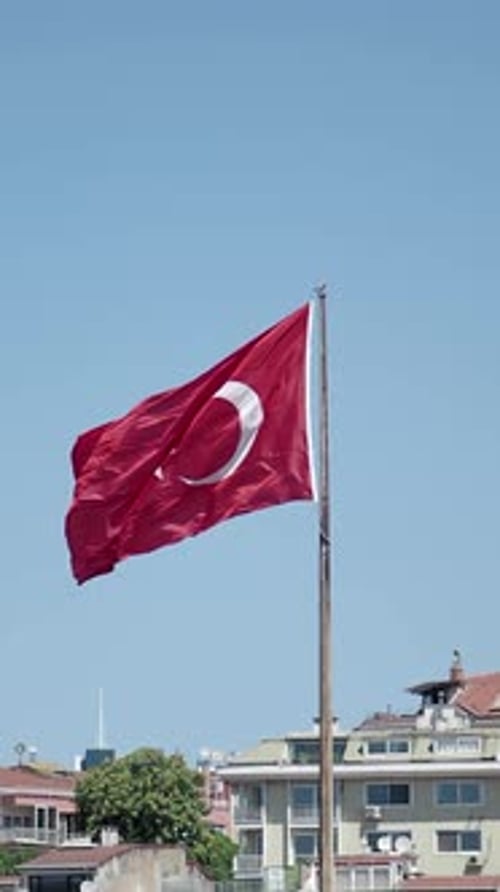 Turkish flag waving on a pole in Istanbul