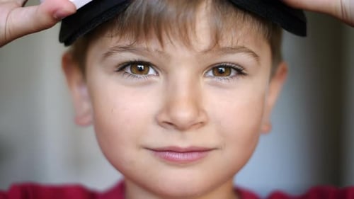Boy Puts on Virtual Reality Headset Close Up