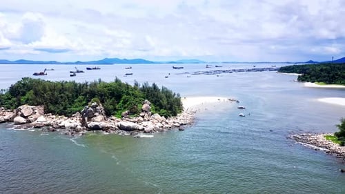 Aerial Top view of a transparent blue sea with beautiful waves at sunny day in summer. air of ocean