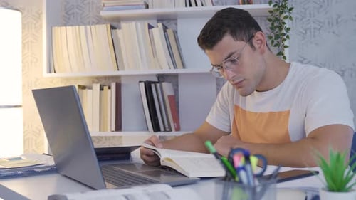 University student reading a book.
