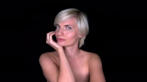 Woman with Short Blonde Hair Posing