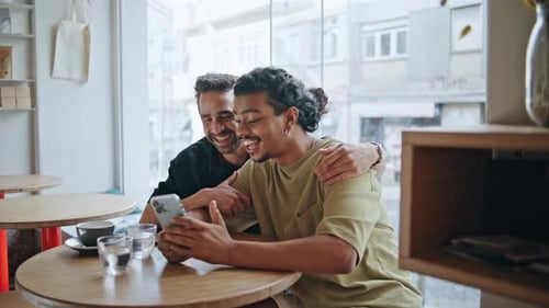 Homosexual Family Video Calling Sitting Restaurant at Romantic Date Close Up
