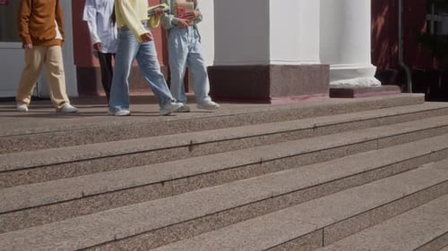 Group of Multiethnic Friends Leaving School After Classes