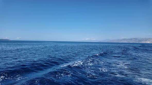 Ionian Mediterranean Sea deep blue water color spume foam ferry ride ...