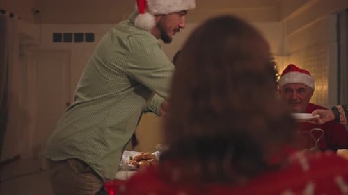 Family Celebrates Christmas Dinner at Home