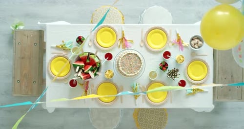 Festive Birthday Table Setup Overhead Shot