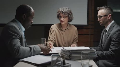 Professionals Working Collaboratively in a Workplace Meeting