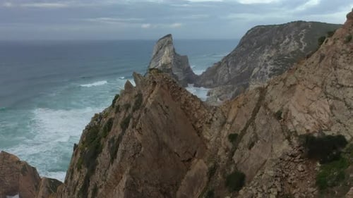 Portugal, Lisbon District, Cliffs surrounding Praia da Ursa beach