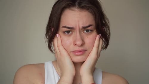 Young Woman Worried Caused of Acne Inflammation and Acne Scar Occur on Her Face Teenage Girl