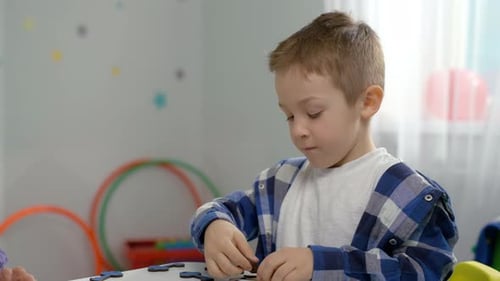 Inspiring Footage of a Child and Teacher Engaging in MindExpanding Games