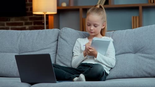 Caucasian Little Cute School Child Girl Kid Elearning Raising Hand Arm Ready to Answer Online Tutor