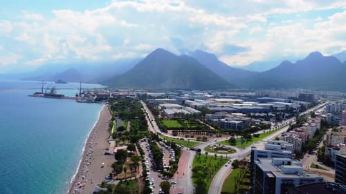 Aerial drone orbit over coastal port infrastructure