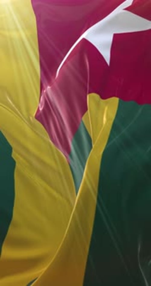 Vibrant Togo National Flag Waving in Sunlight