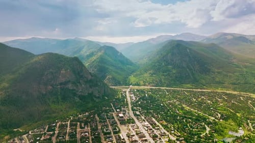 Picturesque resort city located at the foot of amazing mountains. Scenic aerial view of Aspen city
