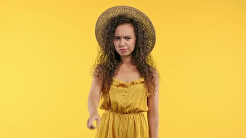 Dissatisfied Woman Disapproving with No Finger Warning Sign Making Negation Gesture