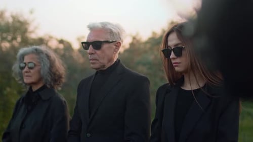 Mourning Family at Funeral Service