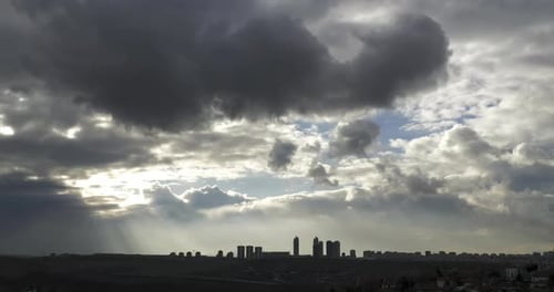 City Skyline Under Dramatic Cloudscape