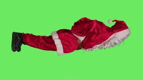 Vertical Video Profile of Santa Suffers From Back Pain in Studio