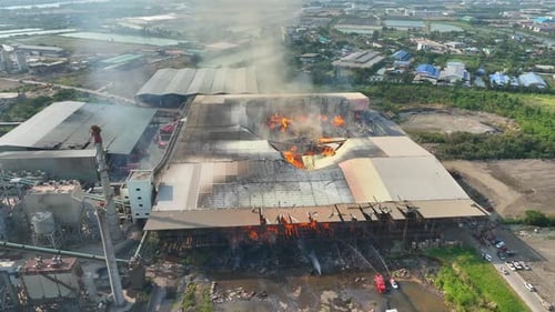 A large industrial facility with significant fire damage.
