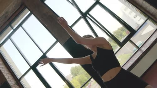 Woman Dancing Contemporary Routine in Studio