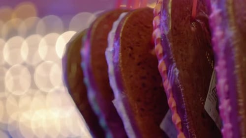 Amusement Park Bokeh Lights at Night. Abstract bokeh background, colourful night city lights. Moving