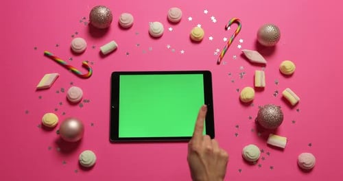 Hands Scrolling Tapping Pages on Tablet with Green Screen