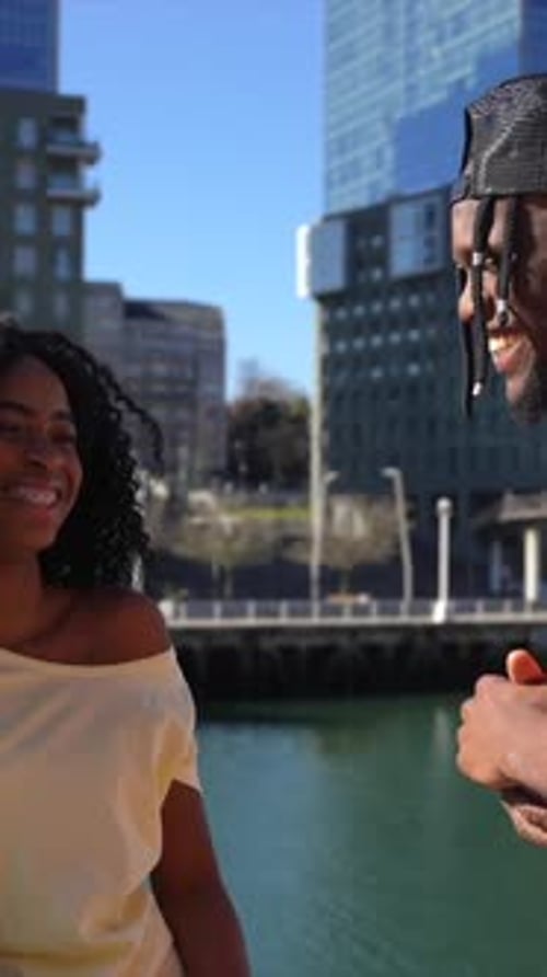 Young african american women in the city, lifestyle friends concept, enjoying sunny day
