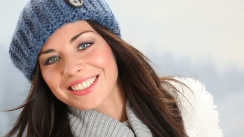 Happy Beautiful Young Woman Relaxing Outdoor in a Winter Day. Portrait Of