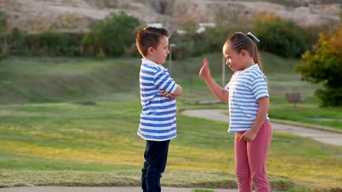 Happy children siblings friends cousins playing fun joyful in neighborhood park in summer vacations