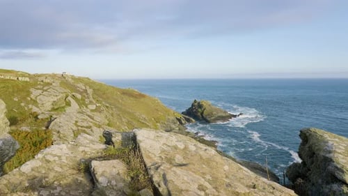 View Over Coastal Cliff Along Beautiful Rocky Coastline With Crashing Waves