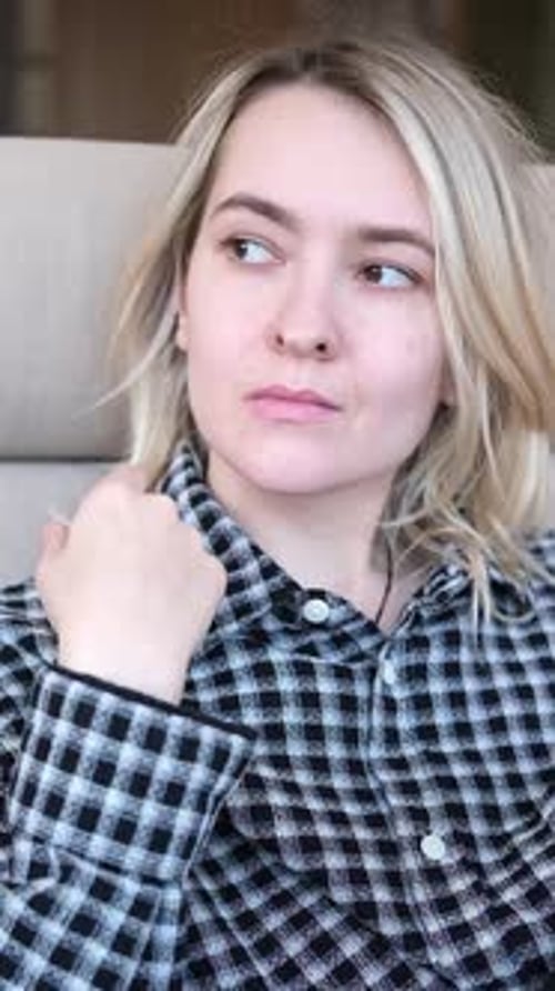 Thinking Confused Woman in the House with Why Questions or Brainstorming Closeup Planning Doubt