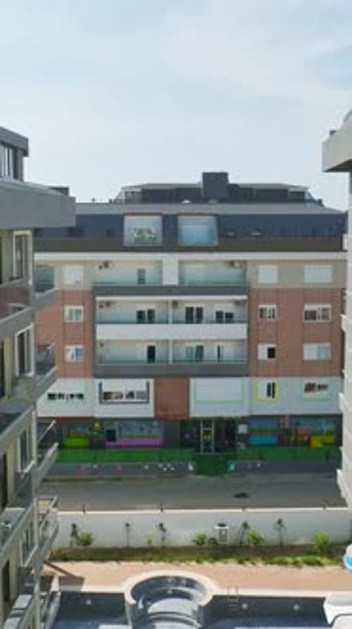 Urban Apartment Complex With Courtyard and Pool