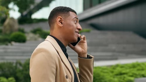 Happy African American Business Man Talking Mobile Phone in City Outdoors Smiling Positive